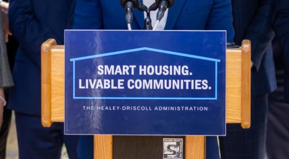 Smart Housing. Livable Communities. (podium sign)