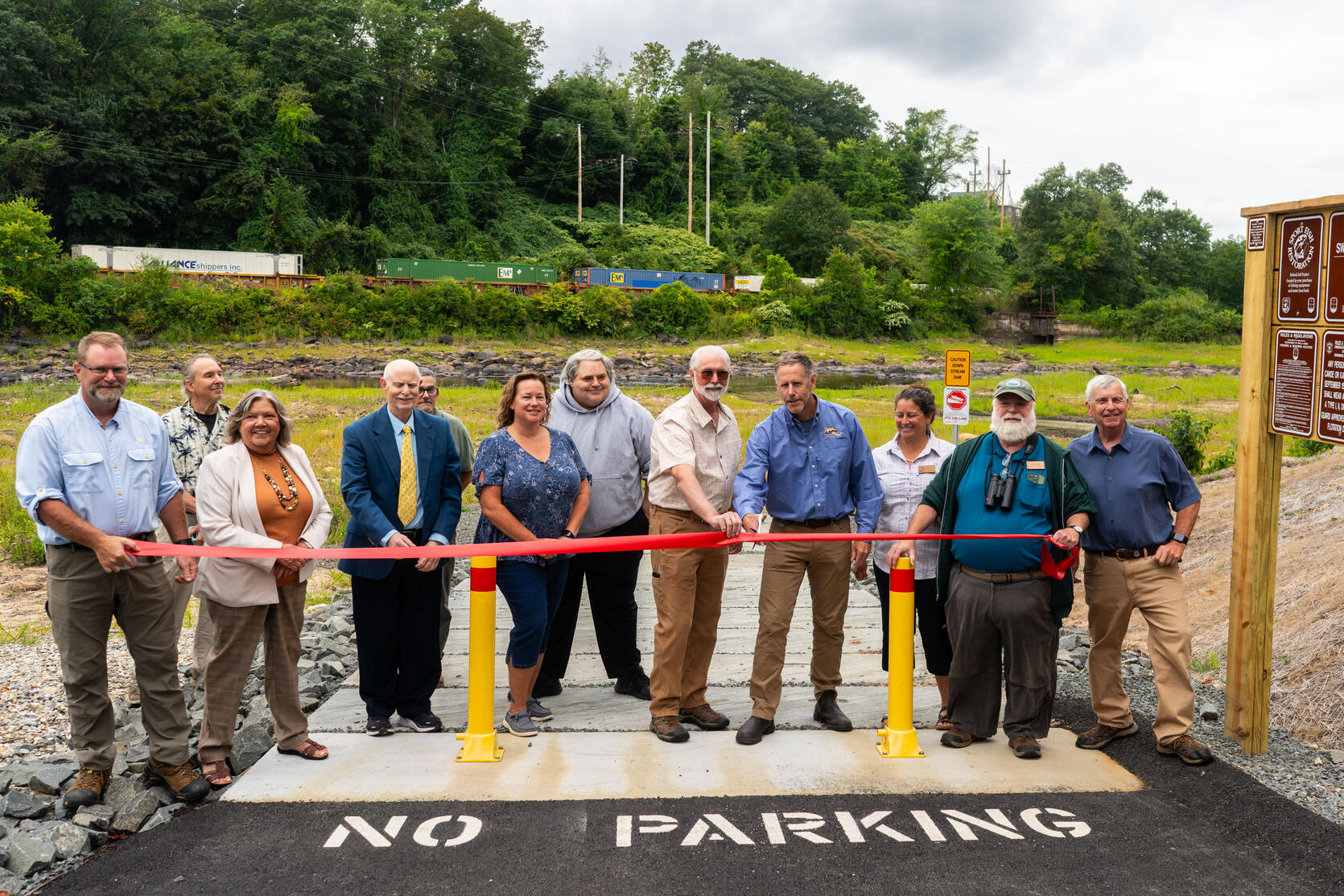 State and local officials and community partners cut the ribbon on the new public access facility constructed by the Department of Fish & Game (DFG) Office of Fishing and Boating Access (OFBA) on the Millers River in Athol.