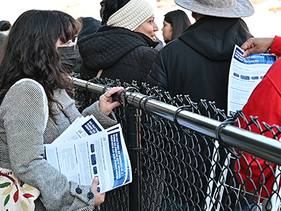 AGO staff handing out flyers