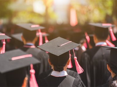 Graduates in cap and gown